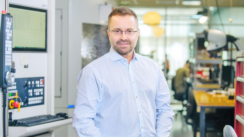 Colleague smiling in the production area